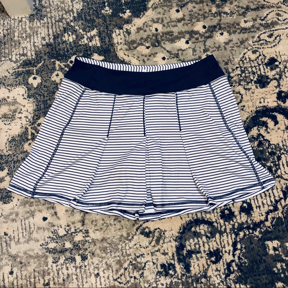 KYODAN PLEATED STRIPED PERFORMANCE SKORT